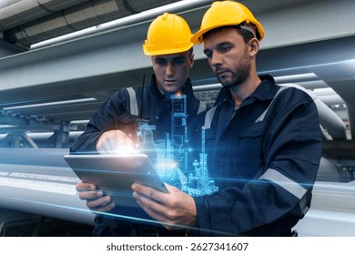 Two refinery engineers in safety gear using a digital tablet to review and analyze gas pipeline system design and maintenance plans.
 - Powered by Shutterstock - Get 15% off with code: PIKWIZARD15
