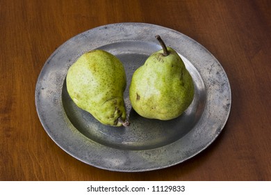 Two Ripe Pears On Pewter Plate