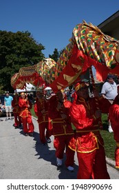 Two Rivers, Wisconsin USA - September 18th, 2019: Chinese Street Performers Perform Dragon Dance At The Ethnic Fest