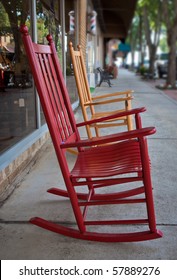 Two Rocking Chairs On Sidewalk In Brevard, NC