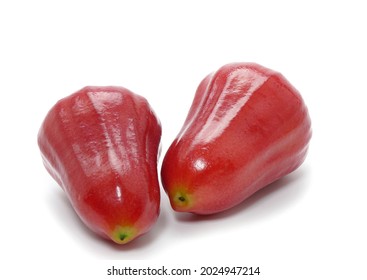 dos manzanas rosa sobre