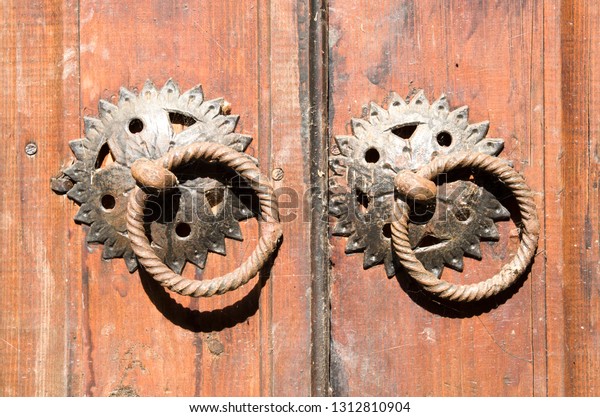 Two Round Doorknobs On Old Wooden Stock Photo Edit Now