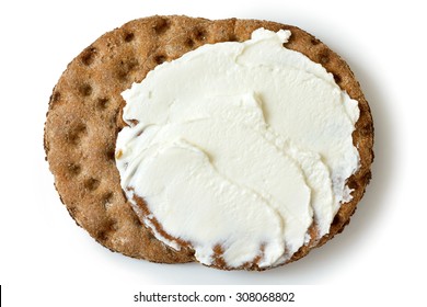 Two Round Rye Crispbread Isolated On White From Above. Spread With Cream Cheese.