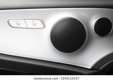 Two Round Speakers In A Car	