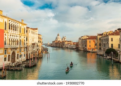 Two Rowers In The Grand Canal In Venice, Italy