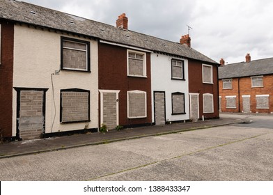 Two Rows Of Derelict Houses