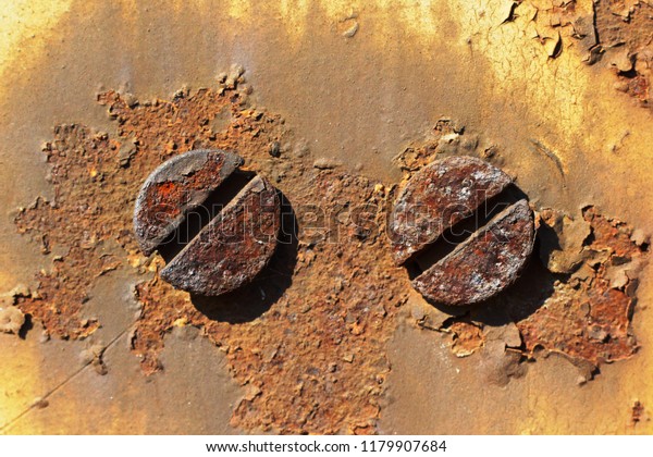 Two Rusty Bolt Heads Metal Wall Stock Photo (Edit Now) 1179907684