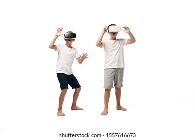 two scared brothers gesturing while using vr headsets on white background