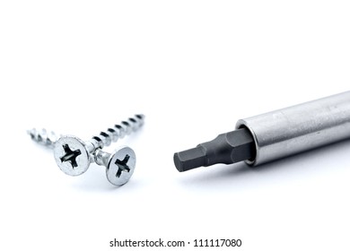 Two Screws With A Screwdriver That Does Not Fit