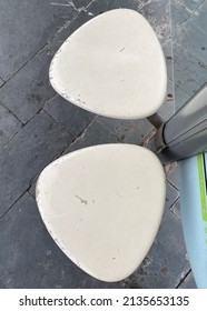 Two Seats At An Outdoor Bus Shelter