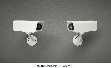 Two security cameras looking at each other.