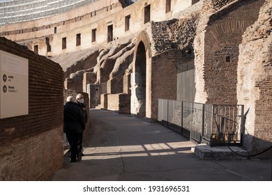 Two Security Guards Speak Inside The Coliseum Half Empty Due To Covid Pandemic 19. Rome Italy 04 03 2021