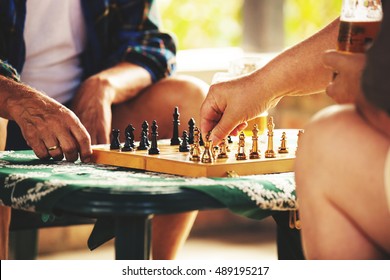 Two Senior Friends Playing Chess.