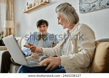Similar – Image, Stock Photo Hallig Gröde | Senior citizen stands in the calm North Sea at low tide and raises her hands to the sky