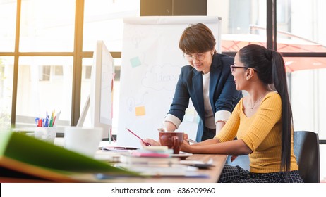 Two Senior Officer Preparing Paper Work In Office Of Creative Workplace, Modern Style Of  Entrepreneur Group Brainstorming Multi Generation Of Creative