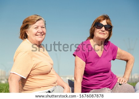 Similar – Image, Stock Photo Senior and young sportswoman looking away