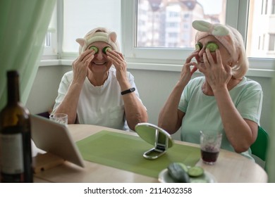 Two Senior Women Apply Facial Cosmetic Mask, Have Fun At Home, Make Selfie And Chat With Friends In Social Media, Wellness And Beauty In Any Age, Body Positivity, Self-esteem And Ageism, Lifestyle