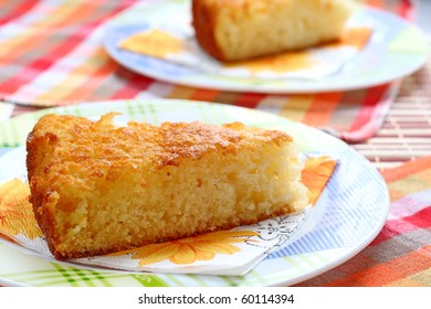 Two Servings Of Semolina Pie. Cake Of Cereals, Sugar And Kefir. Baking For Dessert. Sweet Golden Pie From Semolina. Dish For Baby Food. Loose Semolina Cake.