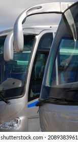 Two Shuttle Buses At The Bus Station