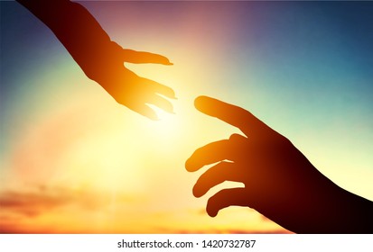 Two silhouette hands on sky background, Helping hand concept - Shutterstock ID 1420732787