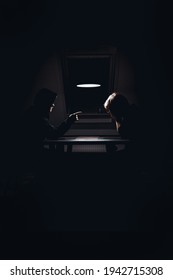 Two  Silhouette People Sitting Across The Table Closed At Home Pointing At One Another, Depression And Anxiety Disorder Concept.