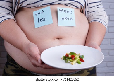 Two Simple Ways To Be Fit. Overweight Fat Woman With Stickers On Her Belly 