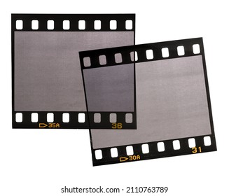 two single 35mm film strips overlapping each other on white background, cool poster or vintage design element.