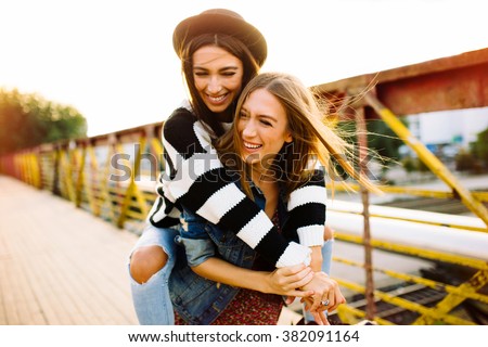 Two sisters having fun outdoor