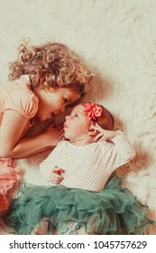 Two sisters look