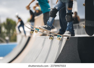 Two skateboarders performing tricks simultaneously. - Powered by Shutterstock
