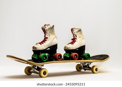 Two skates are on a skateboard. The skateboard is on a white background - Powered by Shutterstock