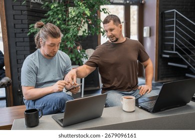 Two skilled professionals devops engaged in collaborative efforts within a contemporary workspace