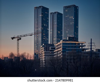 Two Sky Scraper Towers With Cran