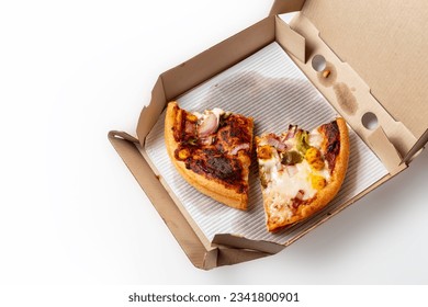 Two slice pizza isolated on a cardboard open box. Margherita Pizza with Paneer Pizza in Carton. top view - Powered by Shutterstock