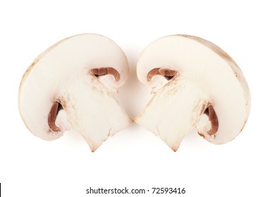 Two Sliced Champignon Mushrooms On White Backround