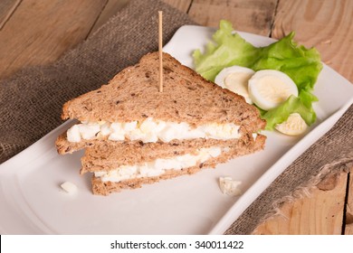 Two Slices Of Egg Salad Sandwich With Lettuce And Whole Grain Bread.Egg Salad Sandwiches. Healthy Eating.