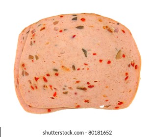 Two Slices Of Freshly Cut Pickle And Pimento Luncheon Meat On A White Background.