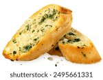 Two slices of garlic bread with fresh parsley isolated on white.