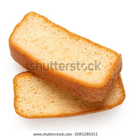 Two slices of plain sponge cake isolated on white. Top view.