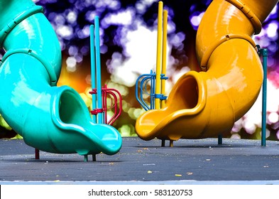 Two Slid Park Children Play Ground On Boke Background