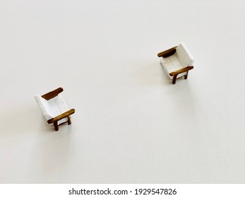 Two Small Chairs Facing Each Other