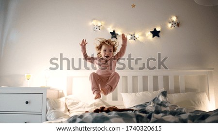 Similar – Foto Bild Zwei Mädchen hüpfen auf dem Trampolin, in der Natur.