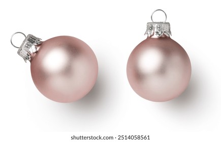 two small pink shabby chic pastel colored Christmas baubles or ornaments, isolated seasonal holiday design elements, flat lay, top view with subtle shadows - Powered by Shutterstock