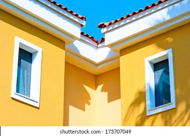 two small windows in the attic under the roof