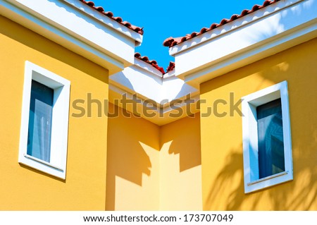 Similar – Image, Stock Photo Yellow house gable and windowless rear of a house with gutter and downpipe