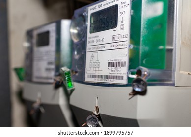 Two smart electric power meter counter measuring power usage.Indoors shot.