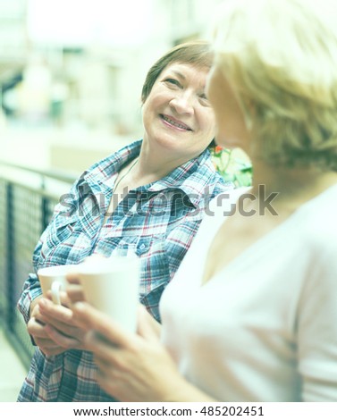 Similar – Female doctor talking to elderly patient in wheelchair