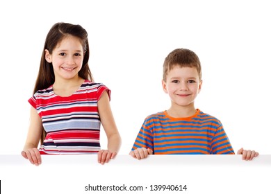 Two smiling kids standing with empty horizontal blank in hands, isolated on white - Powered by Shutterstock