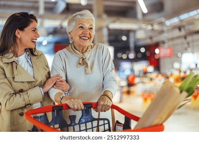 Two smiling women enjoy a shopping trip in a grocery store, showcasing happiness and togetherness. The scene highlights family bonds and everyday life. - Powered by Shutterstock