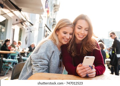 Two Smiling Young Girls Watching Video Stock Photo 747012523 | Shutterstock